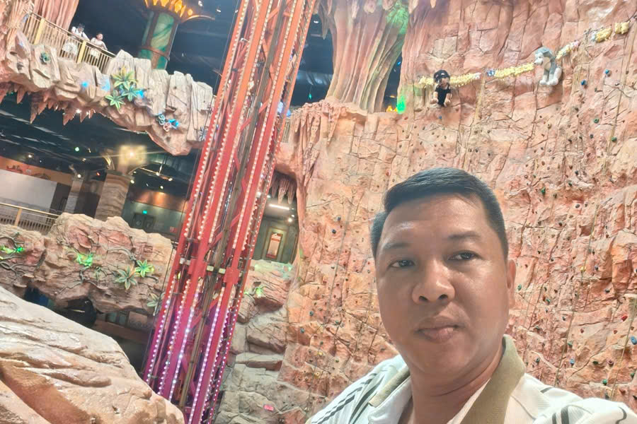 Viet Nguyen takes a selfie inside Fantasy Park at Ba Na Hills