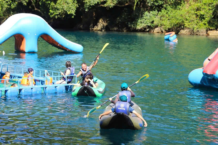 Tourists kayaking on the Chay River in Phong Nha