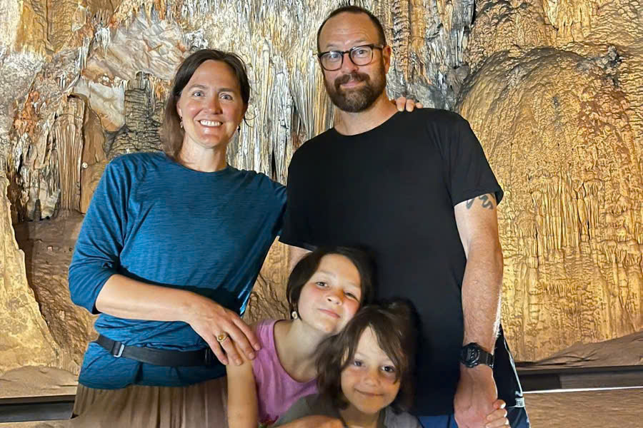 Family taking a photo inside Paradise Cave in Phong Nha