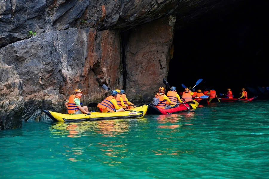 Tourists kayaking on the river during a Phong Nha caves tour
