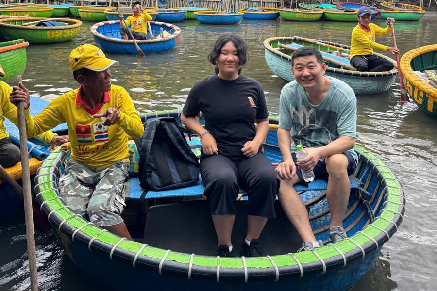 Guests enjoying a traditional basket boat ride in Cam Thanh Village, Hoi An