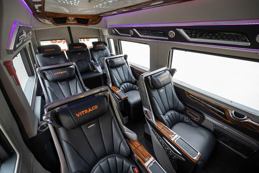 Luxury interior of 9-seat private limousine from Hoi An to Hue with VIP reclining seats
