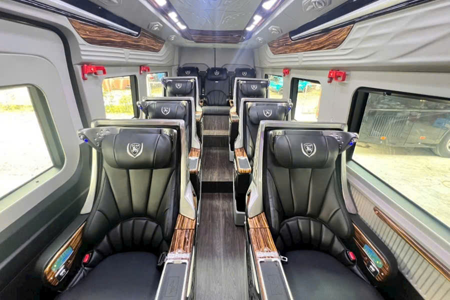 Luxury VIP reclining seats inside private limousine from Hoi An to Hue