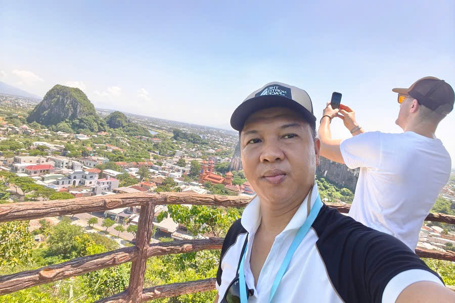 Guide and guest enjoying the views from Marble Mountains