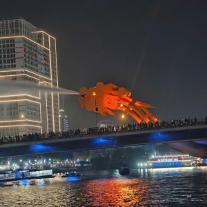 Dragon Bridge in Da Nang performing its fire and water show at night over the Han River