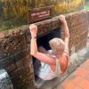 Tourist entering the Ky Anh Tunnels in Vietnam